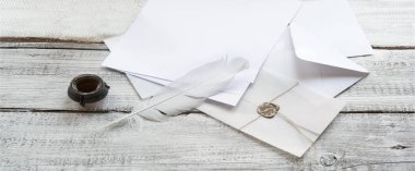 Closeup top view classic rustic age send notepad gift book tool art style sign symbol craft delivery. Grunge wax seal stamp rope tie tag close pack light worn table desk text space artist banner decor