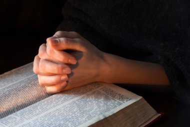 Young israel lady hold palm beg think trust bless love life light Lord Jesus Christ new word. Old retro history teen arab male man guy boy sin soul spirit thank praise peac grace dark night text space