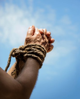 Danger law conflict blue heaven hope text space. Closeup restrict handcuf kidnap punish imprison link frustrate limit. Unable fist bind restrain addict sign close up hopeless abduct arrest caught body