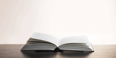 Grunge age dirty rough rustic brown jew psalm pray torah law letter shine dark black wooden desk table space. New culture god Jesus Christ gospel literary big library glow art wood still life concept