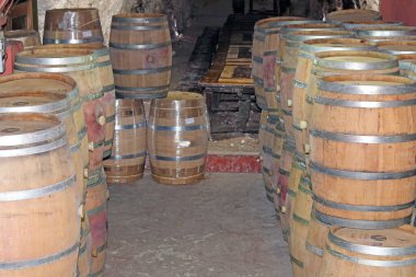 Wine barrels in the basement of Latrun Trappist Monastery also known as the Monastery of Silent Monks, located between Jerusalem to Tel Aviv near Israeli city of Modiin, Israel