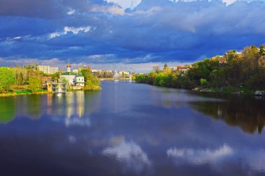 Beautiful view of cityscape in the summer. Church of Blessed Xenia of St. Petersburg  on the riverbank of the river Southern Bug in Vinnytsia, Ukraine
