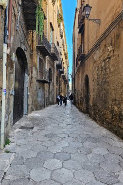 Palermo, Italy - January 24, 2025: Narrow street of the city