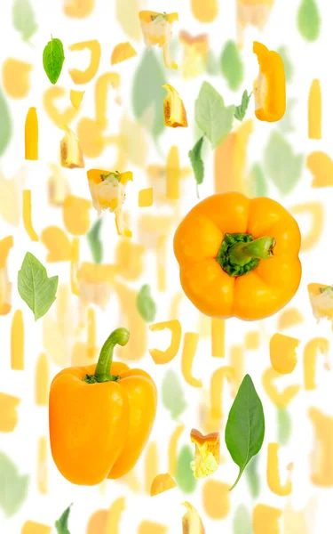 Abstracte Achtergrond Gemaakt Van Gele Paprika Groente Stukken Plakken Bladeren — Stockfoto