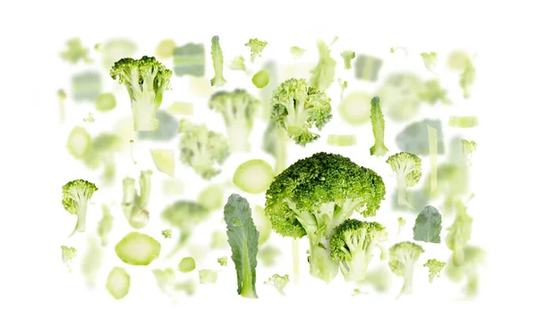 Abstract Background Made Broccoli Fruit Pieces Slices Leaves Isolated White — Stock Photo, Image