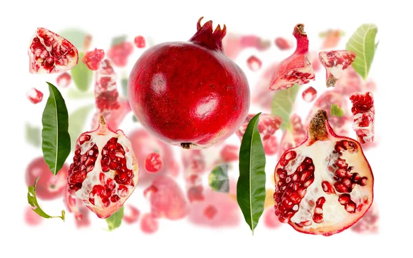 Abstract Background Made Pomegranate Fruit Pieces Slices Leaves Isolated White — Stock Photo, Image