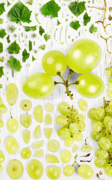 Abstract Background Made Green Grape Fruit Pieces Slices Leaves Wooden — Stock Photo, Image