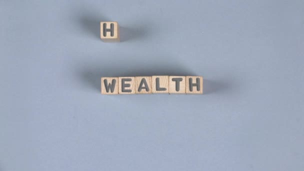 Dřevěné Bloky Nápisem Bohatství Jsou Vyměňovány Zdraví Koncepce Investic Pojištění — Stock video
