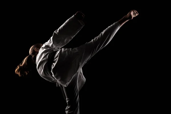 Mladá Dívka Cvičí Karate Dítě Kimonu Černém Pozadí — Stock fotografie