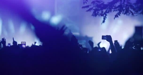 Abstract Silhouette People Crowd Hands Dancing Holding Smart Phones Flashes — Video