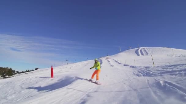 Girl Snowboarding Slopes Swiss Alps — Vídeos de Stock