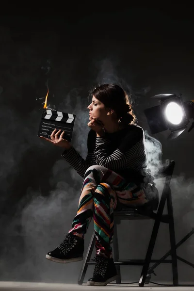 Female Movie Director Set Smoke Background Girl Holding Clapperboard Fire — Stock Photo, Image