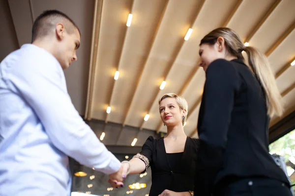 Three Young Business People Having Conversation Shaking Hands Successfull Startup — Foto de Stock