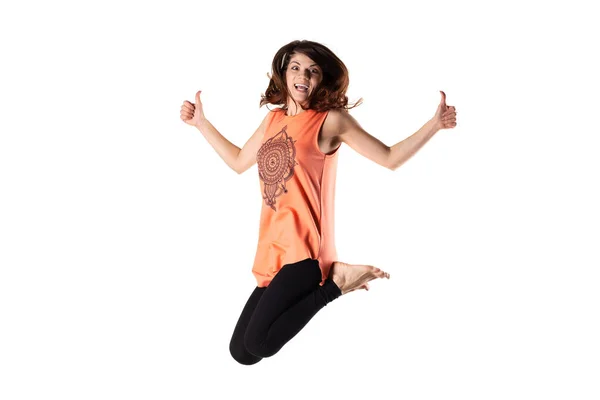 Happy Brunette Girl Orange Outfit Jumping Air White Background — Stock Photo, Image