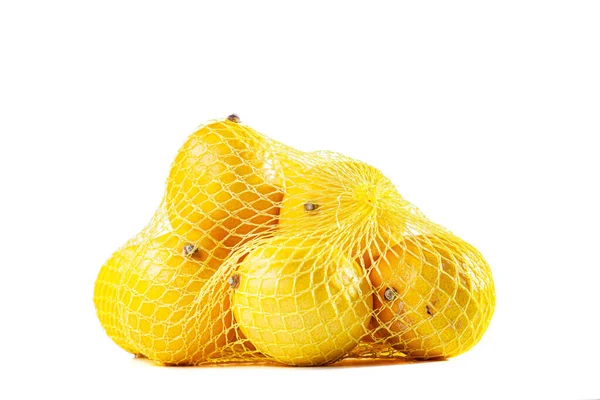 Группа Спелых Лимонов Сетчатом Мешке Белом Фоне — стоковое фото