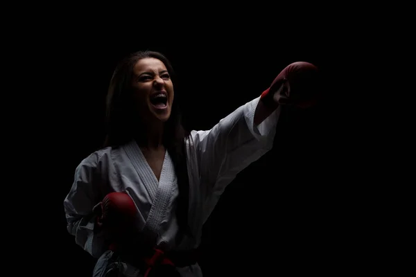 Girl Exercising Karate Punch Screaming Black Background — Stock Photo, Image