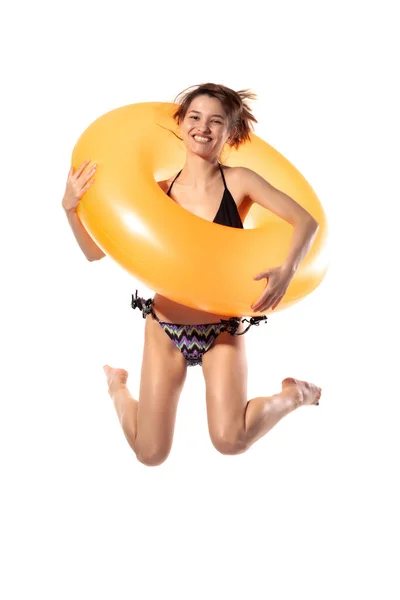 Beautiful Young Sexy Woman Black Swimsuit Jumping Orange Inflatable Rubber — Stock Photo, Image