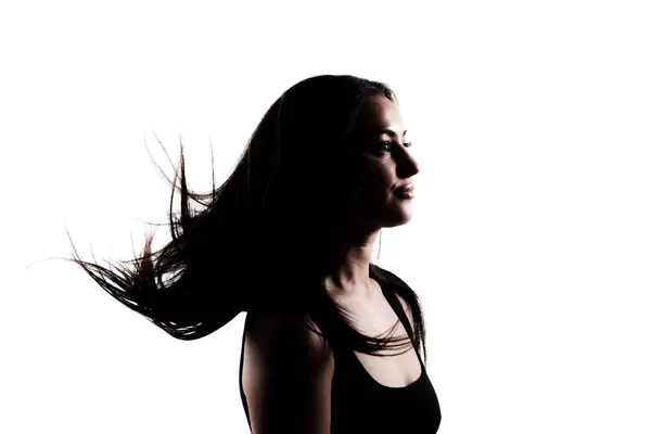 Silhouet Van Een Jonge Vrouw Met Lang Haar Lucht Geïsoleerd Stockafbeelding