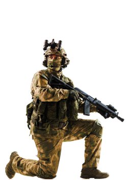 Depicts a soldier in camouflage uniform and equipment, crouching, holding a weapon, set against a clean white background for high contrast, showcasing concepts of military, bravery, and preparedness. clipart