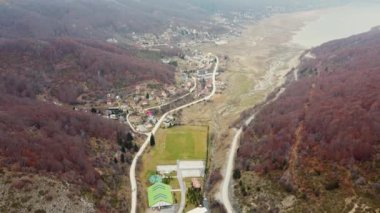 Mavrovo Lake and Hotels in North Macedonia, offering scenic views of the mountains, forests, and the lake. Perfect for travel and tourism.