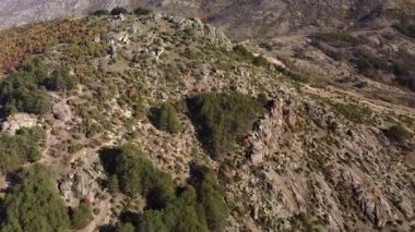 Aerial drone video flying over rocky mountain in the balkans.