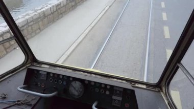 Vintage tram interior in Sarajevo, Bosnia and Herzegovina, offering a unique drivers perspective.