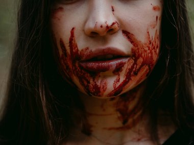 Haunting Beauty: The Bloody Woman of Halloween clipart