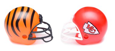 IRVINE, CALIFORNIA - 23 JAN 2023: Helmets for the Cincinatti Bengals and Kansas City Chiefs, opponents in the AFC Conference Championship Game. clipart
