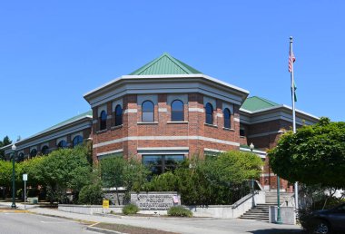 BOTHELL, WASHINGTON - 3 JULY 2023: The Bothell Police Department building across from hte City Hall. clipart