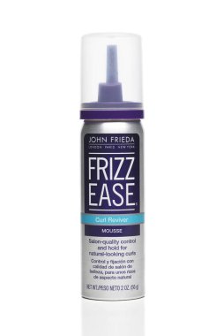 IRVINE, CALIFORNIA - 3 JAN 2024: A can of Frizz Ease Curl Remover Mousse by John Frieda. clipart