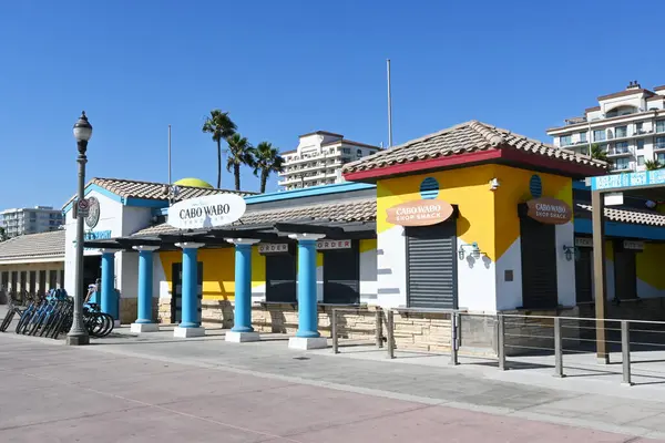 stock image HUNTINGTON BEACH, CALIFORNIA - 17 SEPT 2024: The Cabo Wabo Sand Bar on the boardwalk near the Huntington Beach Pier.