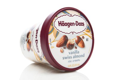 IRVINE, CALIFORNIA - 07 OCT 2024: A carton of Haagen-Dazs Vanilla Swiss Almond Ice Cream, laying on its side. clipart