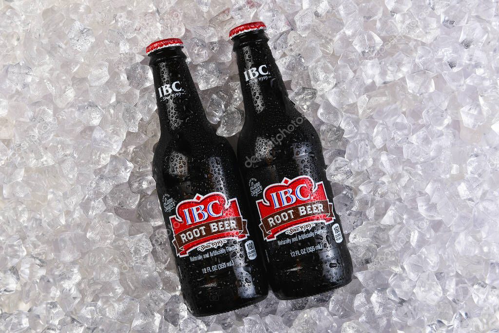 IRVINE, CALIFORNIA - 30 OCT 2024: Two bottles of IBC Root Beer on a bed of ice.