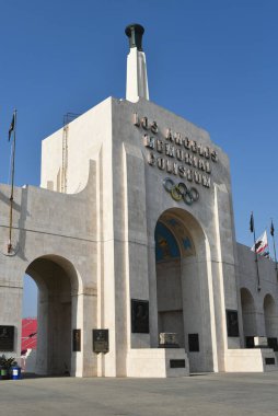 LOS ANGELES, CALIFORNIA - 4 DEC 2024: The Los Angeles Memorial Coliseum in Exposition Park.  clipart