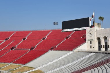 LOS ANGELES, CALIFORNIA - 4 DEC 2024: The Argyros Plaza at The LA Memorial Coliseum, with Jumbotron and seating.  clipart