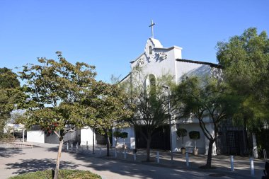 LOS ANGELES, CALIFORNIA - 2 DEC 2024: Our Lady Queen of Angels Catholic Church across from Olvera Street. clipart