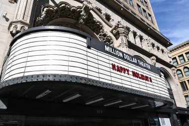 LOS ANGELES, CALIFORNIA - 2 DEC 2024: The Million Dollar Theatre, on Broadway, was one of the first movie palaces built in the united States. clipart