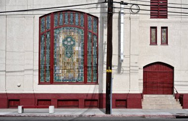 LONG BEACH, CALIFORNIA - 22 JAN 2025: Stained Glass Window at St. John Baptist Missionary Church. clipart