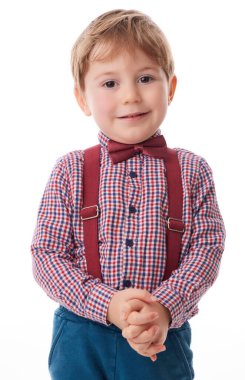 Noel Baba kumaşında kravat ve pantolon askısı olan iyi bir çocuk, Noel ve eğitim konsepti