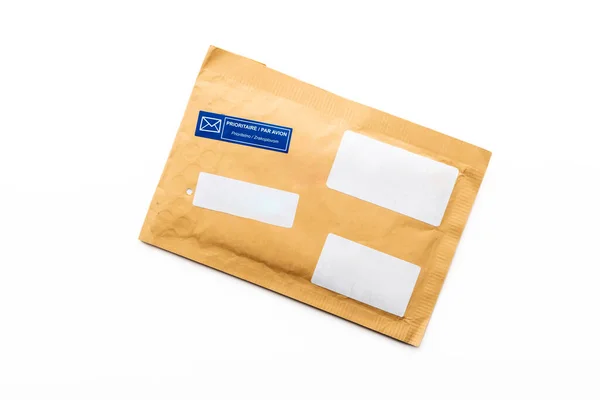 白い背景 段ボール袋 パッケージのペーパー レターで隔離されるパッド付き封筒の上のビュー ストック写真
