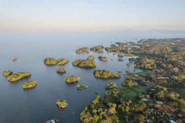 Granada islands in sunset light with Ometepe island background aerial drone view clipart