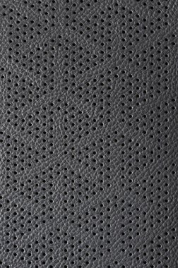 Delinmiş siyah deri arkaplan dokusu yakın görünüm