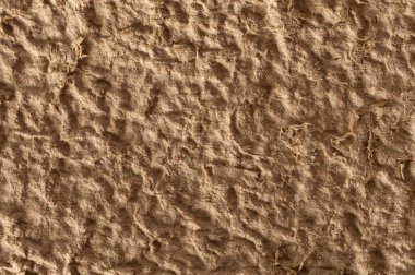 Kahverengi kil soyut arka plan. Bej renk yapısının deseni