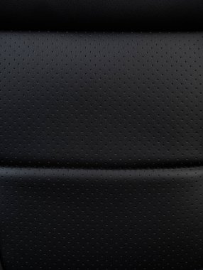 Temiz siyah delikli deri dokuma düzlemi makro yakın görünüm