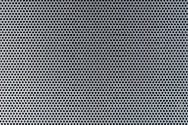 Çember deliklerini delip görüntüyü kapatan metal ızgara dokusu