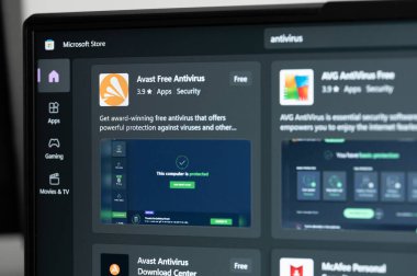 New york, USA - April 20, 2023: Antivirus in Microsoft store on laptop screen close up view clipart