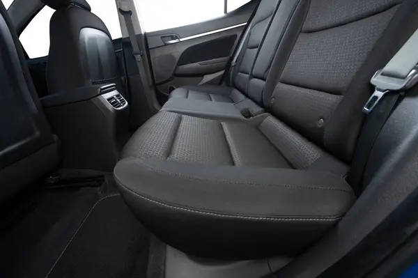 stock image Rear car space with AC vent and dark interior and isolated window