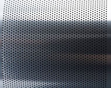 Metallic perforated texture background macro close up view clipart