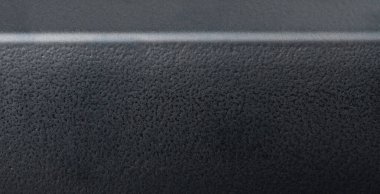 Üstünde düz çizgi olan siyah desenli plastik arkaplan