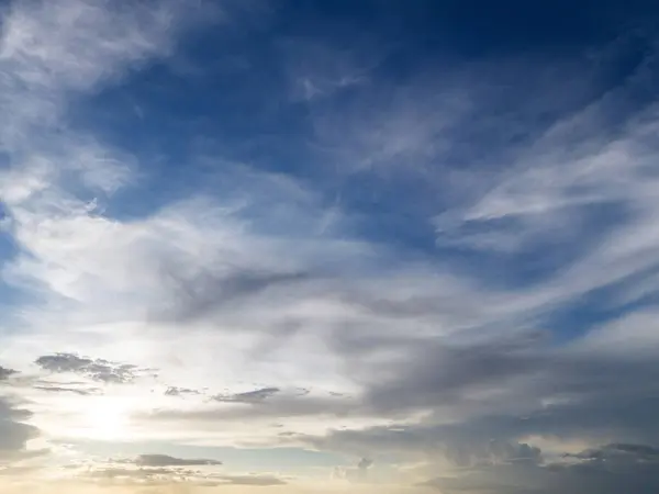 stock image Soft spread clouds on blue sky background in golden time